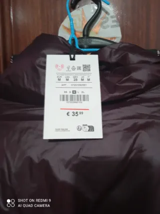 Plumífero corto acolchado morado