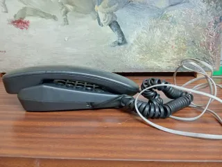 Teléfono fijo antiguo pequeño