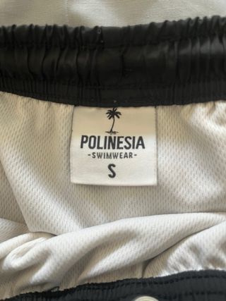 Bañador negro y turquesa de polinesia