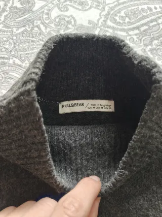 Jersey gris cuello alto