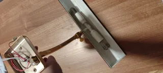 Lámpara de pared dorada y gris