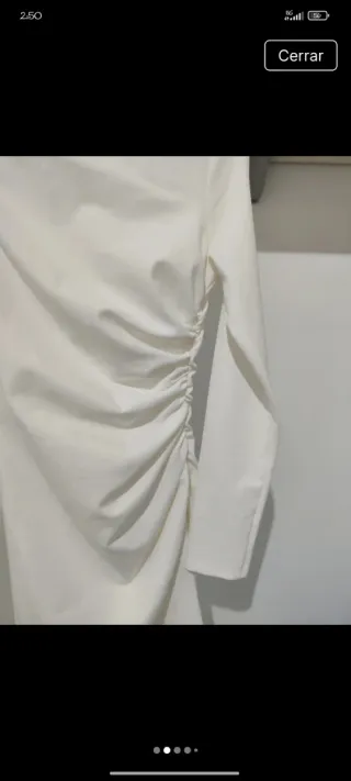 Zara. Vestido midi blanco manga larga