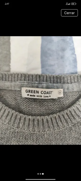 Jersey gris con rayas negras