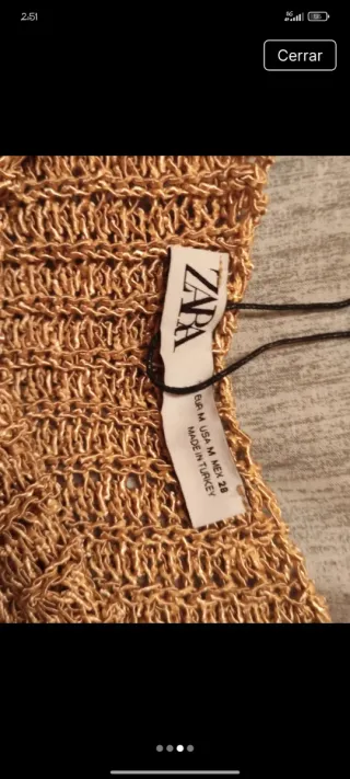 Zara. Con etiqueta. Jersey corto