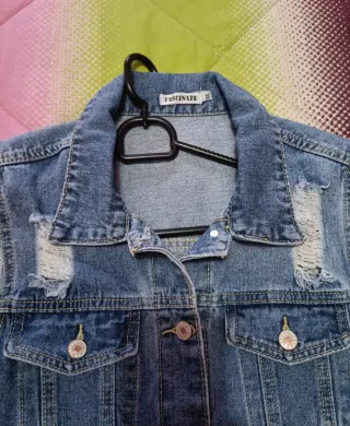 Chaleco vaquero desgastado