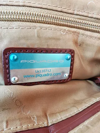 Tracolla Piquadro rossa in tessuto e pelle