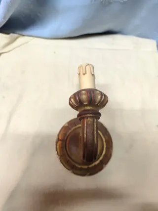 Applique in legno dorato