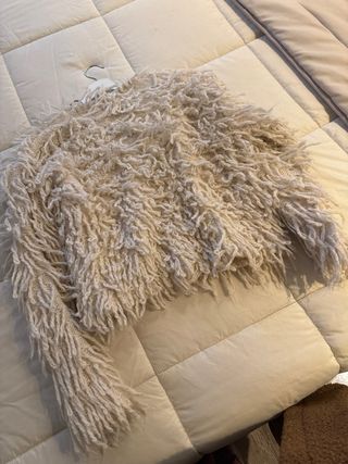 Chaqueta beige con flecos