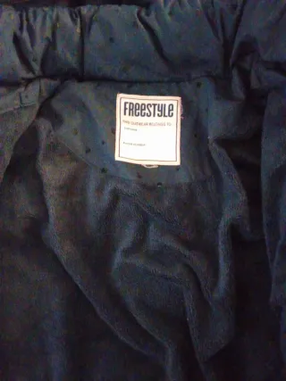 Abrigo niña azul con puntos