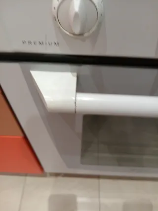 Electrodomésticos vitrocerámica, horno,campana.