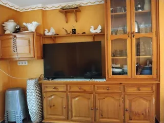 Mueble de salón madera y cristal