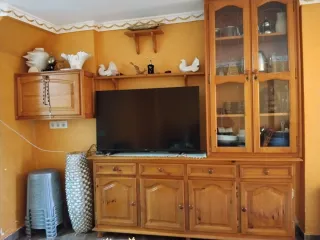 Mueble de salón madera y cristal