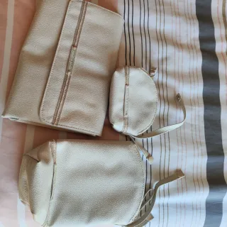 Portachupete, cambiador y portabiberón