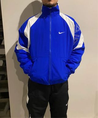 Chaqueta cortavientos Nike azul y blanco