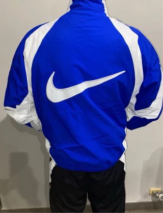 Chaqueta cortavientos Nike azul y blanco