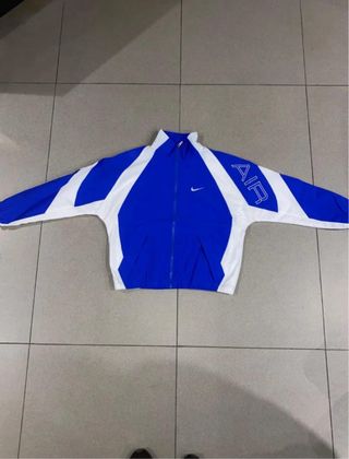 Chaqueta cortavientos Nike azul y blanco