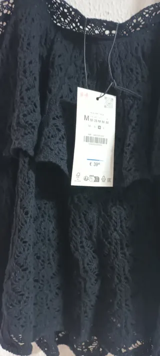 Top negro punto volante