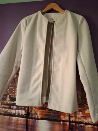 Blazer cuello redondo con cinturón