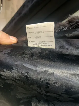 Chaqueta de piel marrón y negra