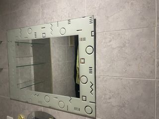 Espejo con borde decorado