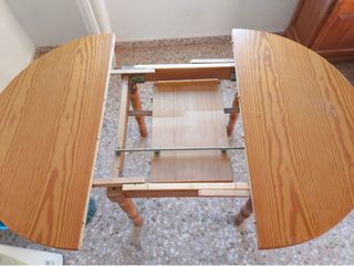 Mesa redonda de madera extensible