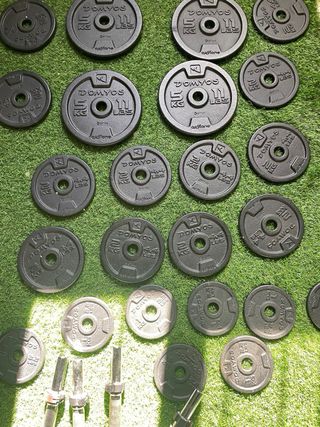 Discos y barras mancuernas Domyos
