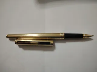 Penna Paper Mate dorata in confezione