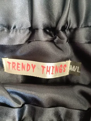 Minifalda de plumas azul y gris