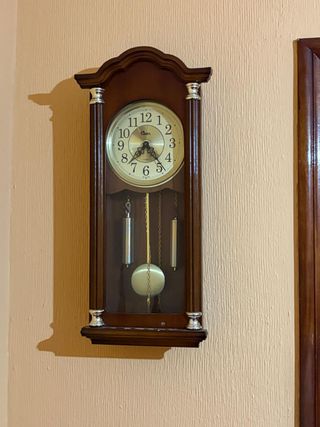 Reloj de pared antiguo madera y metal