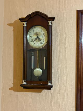 Reloj de pared antiguo madera y metal