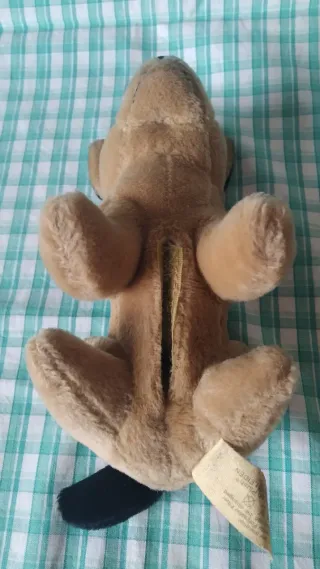 Peluche perro marrón y negro