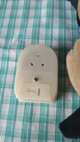 Peluche perro marrón y negro