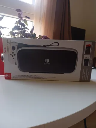 Nintendo Switch OLED + Funda + Factura