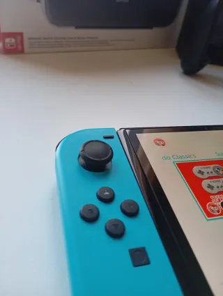 Nintendo Switch OLED + Funda + Factura