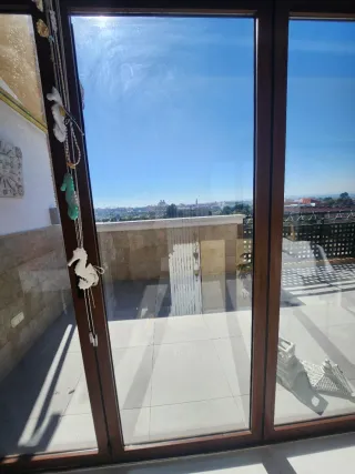 Puertas Plegables de Aluminio  en lacado madera