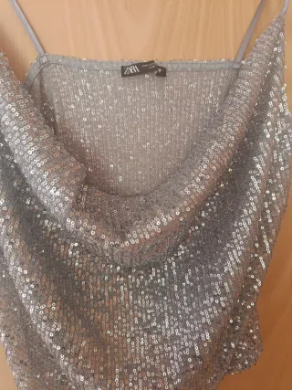 2 Top lentejuelas y falda