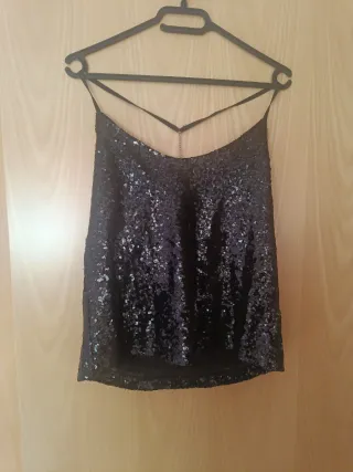 2 Top lentejuelas y falda