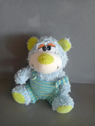 Orsetto morbido con tutina azzurra