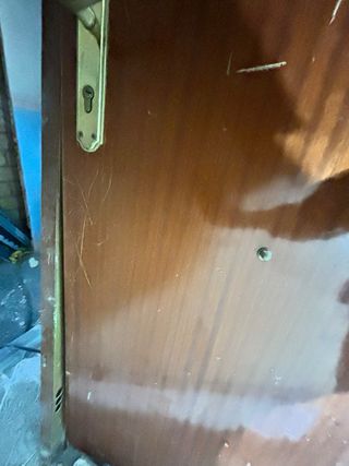 Puerta de entrada vivienda madera