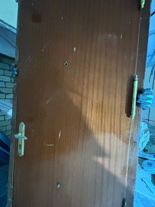 Puerta de entrada vivienda madera