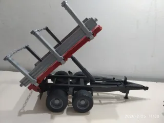 Tractor Claas con remolque BRUDER escala 1/20