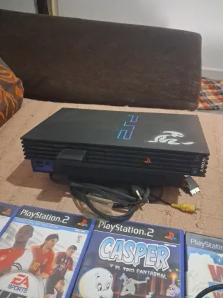 Consola PlayStation 2 con juegos
