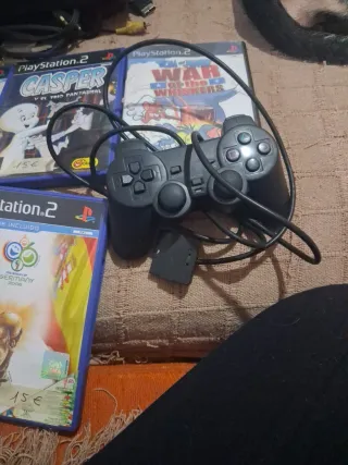 Consola PlayStation 2 con juegos