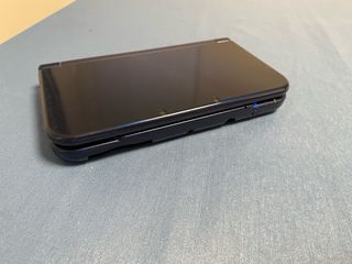 Nintendo NEW 3DS XL + 3 juegos + 2 fundas