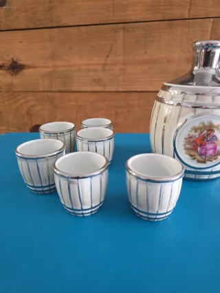 Juego licor porcelana jarra y 6 vasitos
