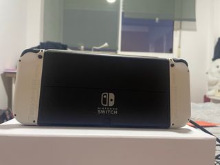 Nintendo Switch OLED + Pokémon Púrpura