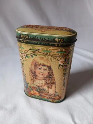 Lata antigua de galletas con imagen niña