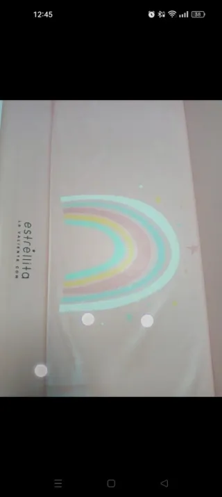 Cambiador bebé rosa con arcoíris