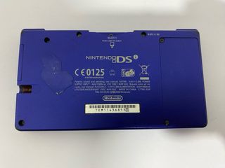 Nintendo DSi, cargador y juegos