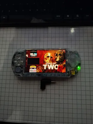 PSP Transparente Sony + 64 Gb de memoria con juego